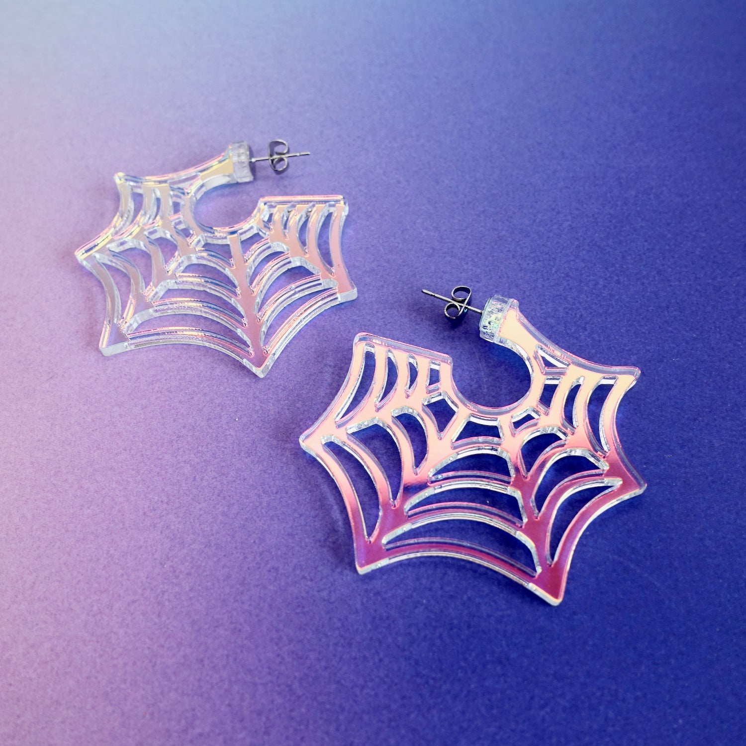 Spooky iridescent spiderweb hoop earrings