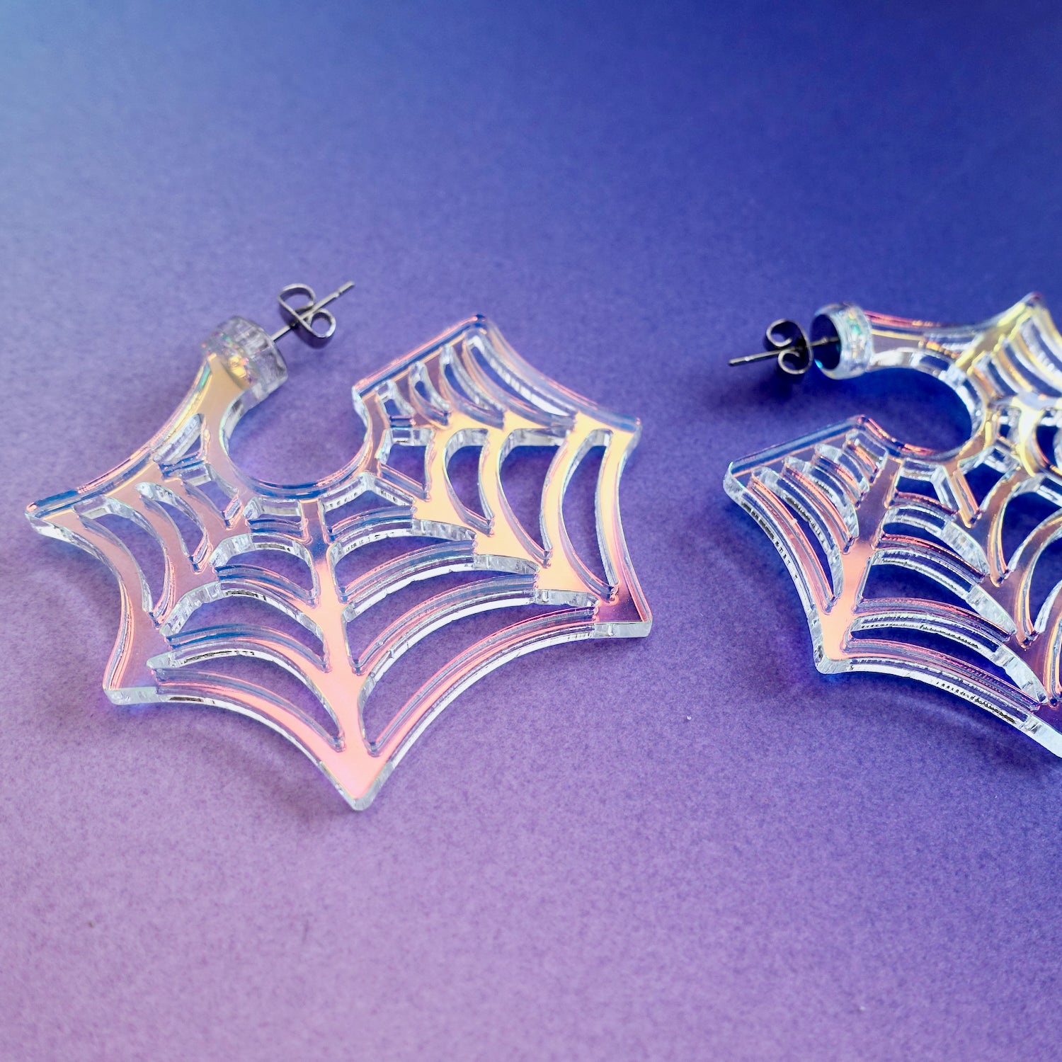 Spooky iridescent spiderweb hoop earrings
