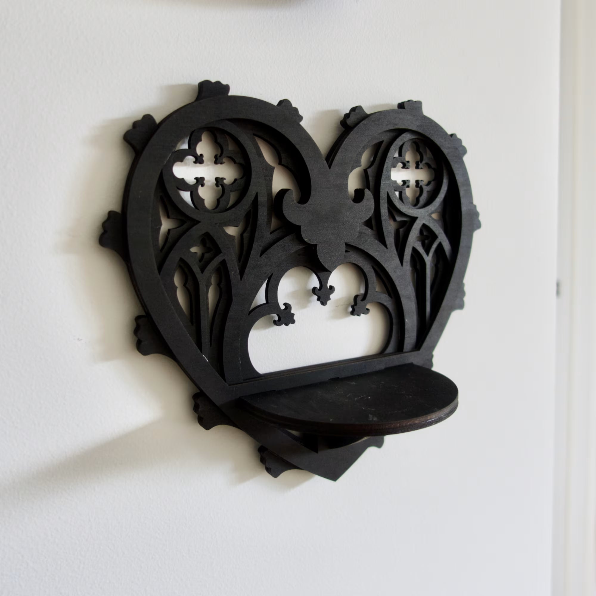Dark Heart gothic wall display — handmade black plywood shelf for alternative and spooky chic homes.