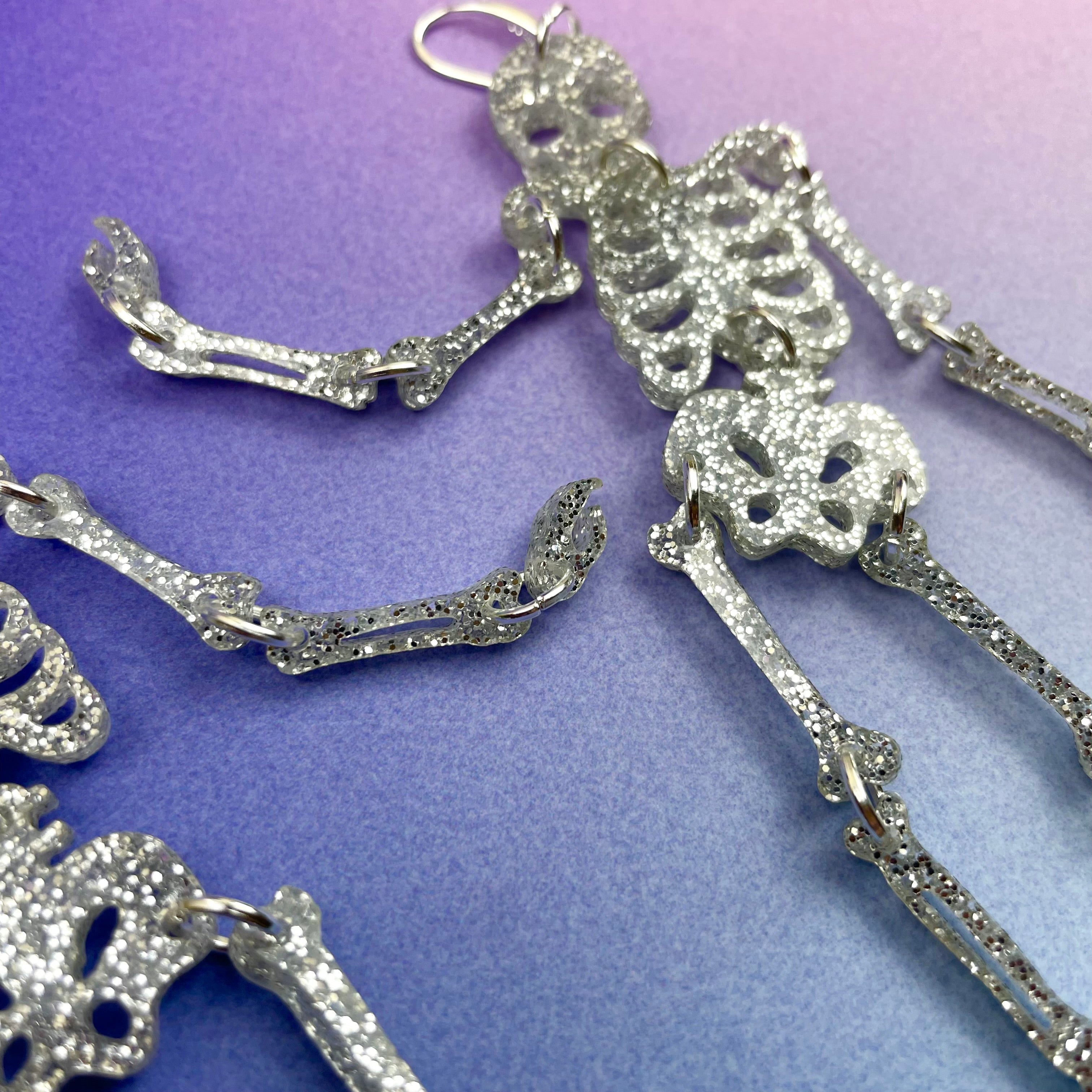 large silver skeleton earrings
