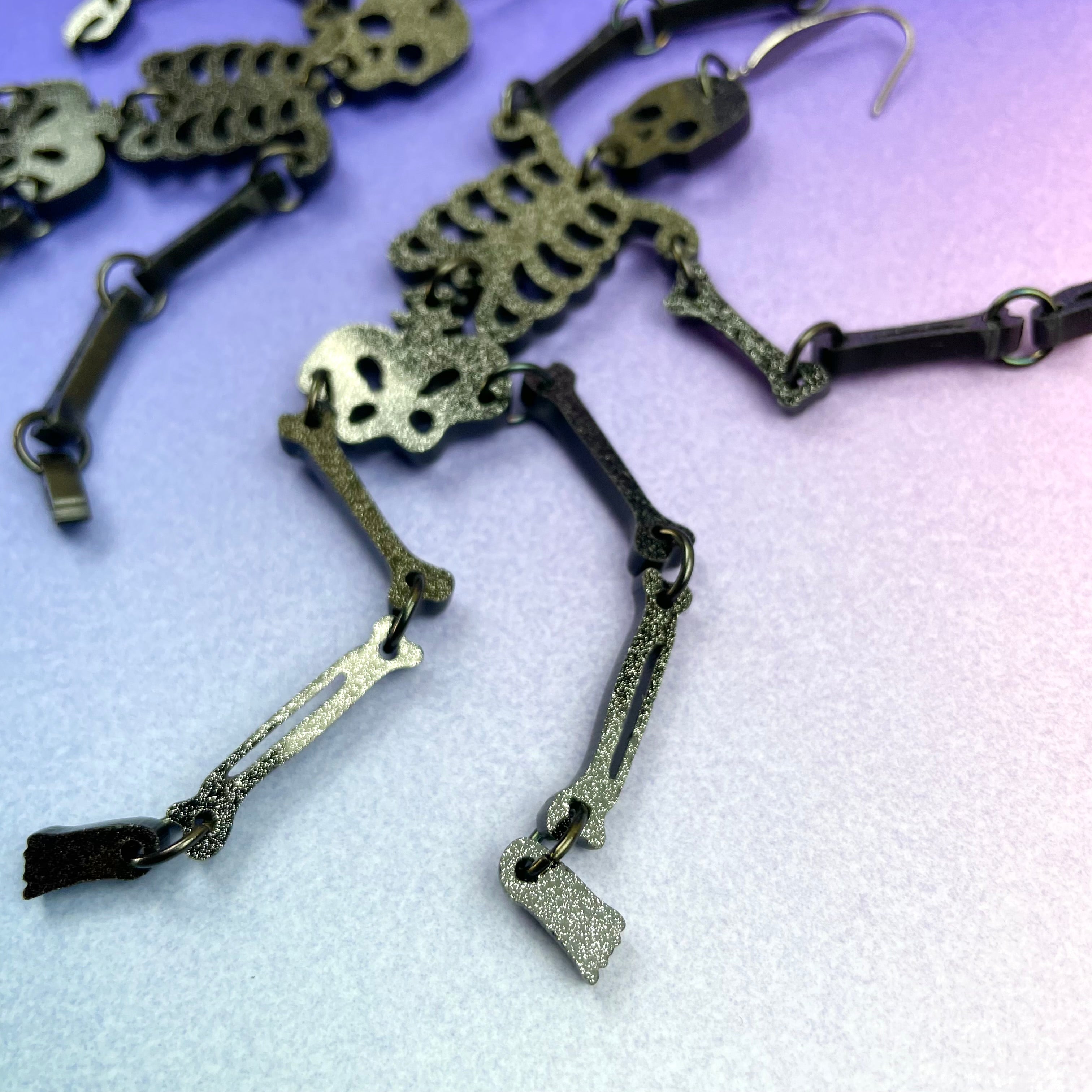 huge skeleton earrings