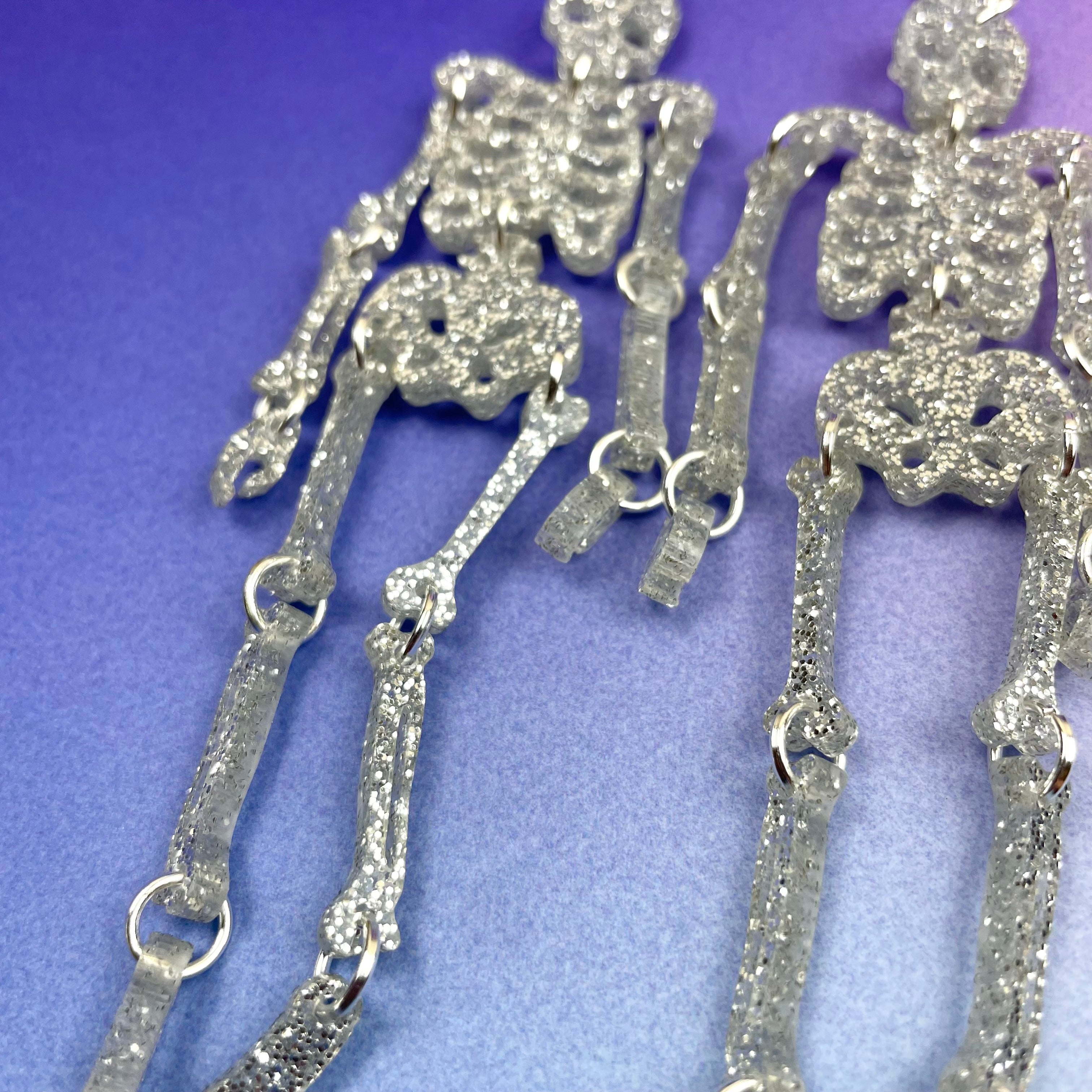 large silver skeleton earrings