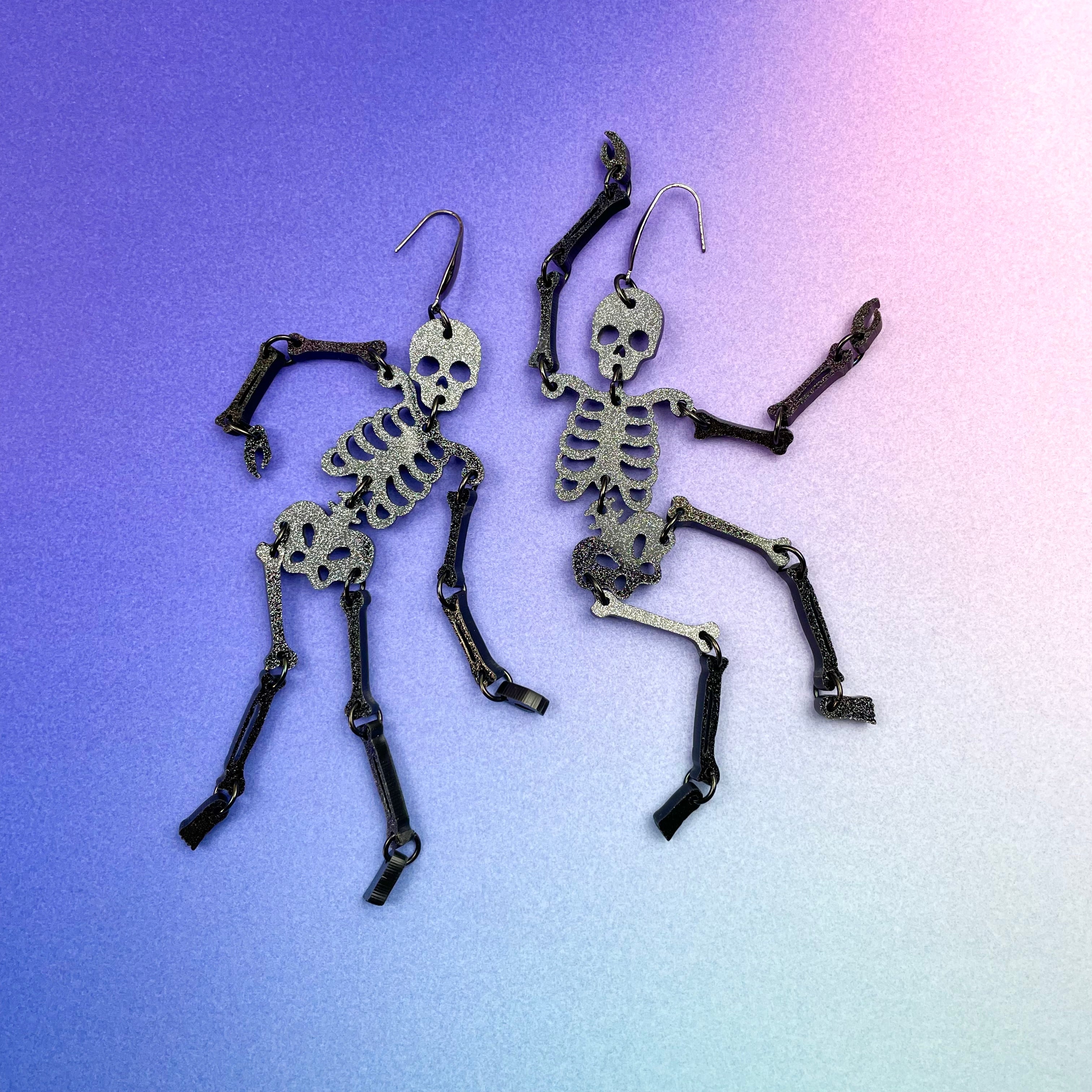 black glitter skeleton earrings